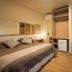 Hotel Cabanas Alto Da Serra in Canela: twin guest room with two beds, nightstands, and wardrobe