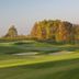 Dwór Sieraków in Sieraków: scenic golf course with sand bunkers and autumn trees