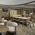 SpringHill Suites by Marriott Jacksonville North I-95 Area lobby seating area with tables and chairs