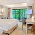 Khaolak Emerald Beach Resort & Spa in Phangnga, bright guest room with balcony view and desk
