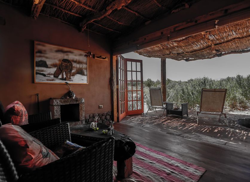 Eco-Lodge El Andinista in San Pedro de Atacama with a rustic terrace and desert views
