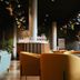 Hotel Guestapart Aarhus lounge with bar, round tables and floor-to-ceiling windows