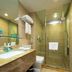 Zhehai Hotel Ningbo bathroom with glass shower, marble vanity and towel rack in Ningbo