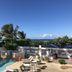 The Beach Guesthouse in La Torre with pool, loungers, and ocean view
