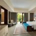 Courtyard by Marriott Bali Nusa Dua Resort room with balcony, king bed, and seating area in South Kuta