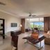Presidential Suites by Lifestyle in Puerto Plata living room with ocean-view balcony