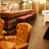 Fletcher Hotel-Restaurant La Ville Blanche in Thorn, stone-walled bar with leather armchairs and red stools