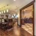 Hampton Inn Colorado Springs-Airport lobby bar with high-top seating and warm wood floors in Colorado Springs
