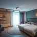 Witte Berken Natuurhotel in Epe guest room with twin beds, desk, sitting area, and large window
