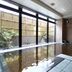 Hotel Route-Inn Obihiro Ekimae indoor hot spring bath with large windows in Obihiro