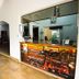 Hotel Sao Charbel in Ubatuba lobby with front desk and seating area