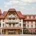 Tribe Le Touquet in Le Touquet, hotel exterior with red-tiled roof and balconies