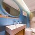 Home Inn Neo Changzhou Wanda Plaza Tongjiang Avenue bathroom with sink, mirror and glass shower in Changzhou
