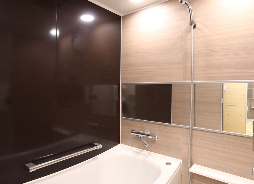Hotel Gracery Asakusa, Tokyo bathroom with bathtub, shower, and modern tile wall