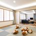 Kitayuzawa Mori no Soraniwa in Date: spacious tatami room with low cushions and adjoining lounge area