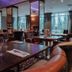 Dunadry Hotel And Gardens in Antrim dining room with set tables and large windows