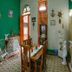 Casa Colonial Carmen in Havana: colorful colonial dining room with tiled floor and open doorway