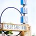 Blue Sage Inn & Suites in Blanding sign with blue cube logo and archway