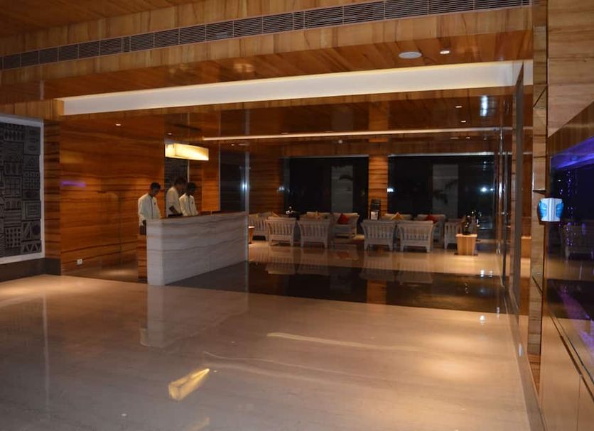 Welcomhotel By ITC Hotels, Kences Palm Beach, Mamallapuram lobby with reception desk and lounge seating