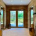 Schlosspark Mauerbach spa hallway with wooden doors and garden view in Mauerbach