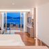 Oceanfront Beach Resort in Patong with a sea-view room, balcony seating, and ocean horizon