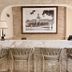 Hôtel Colbert Palace lobby bar with marble counter and woven stools in Antananarivo