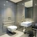 The Capital Menlyn Maine Pretoria bathroom with walk-in shower, wall-mounted toilet and sink