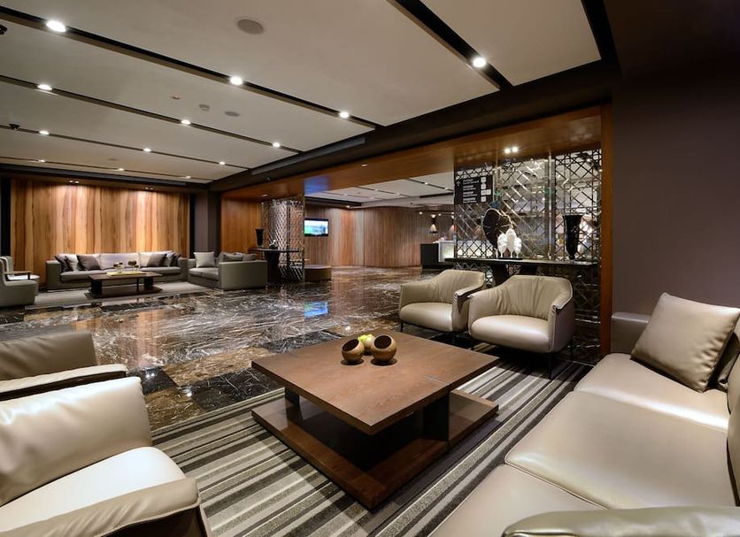 Hualien Holiday Hotel lobby lounge in Hualien City with leather seating and coffee tables