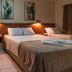 Foz Central Budget Hotel in Foz do Iguaçu guest room with two beds and wall art