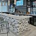Hilton Garden Inn Birmingham SE/Liberty Park bar with mosaic-front counter and high stools