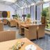 Waldhotel Bärenstein in Horn-Bad Meinberg lounge dining room with large windows and forest views