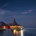 Anantara Veli Maldives Resort overwater restaurant at dusk in Veligandu Huraa, Maldives