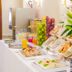 Raeli Hotel Lazio Rome breakfast buffet with fruit, pastries, juice and coffee service