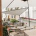 Hotel Weisses Haus in Bad Kissingen outdoor terrace with tables, chairs, and flowers