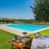 Herdade da Malhadinha Nova - Relais & Châteaux in Beja: outdoor pool with alfresco dining under a tree