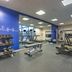 Holiday Inn Express & Suites Zanesville North gym with treadmills, dumbbells and mirrored walls in Zanesville