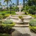 Seagarden Beach Resort in Montego Bay with landscaped garden and tiered fountain