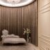 Hotel Maremons in Sokcho: elegant chaise lounge before shimmering curtain backdrop and chandelier