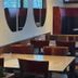 Bridgewater Hotel in Bridgewater dining area with tables, chairs, mirrors, and windows