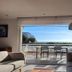 Hpc Suites in Cassis living room opening to a terrace with sea and cliff views