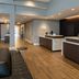 Residence Inn by Marriott Wilkes-Barre Arena lobby with front desk and wood flooring