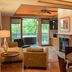 1886 Crescent Hotel and Spa in Eureka Springs: suite with fireplace, balcony, and kitchen area