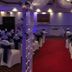 Ashbourne House Hotel in Ashbourne wedding reception room with red aisle and white chairs