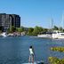 Delta Hotels by Marriott Thunder Bay with waterfront marina view and paddleboarder