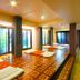 Anyavee Tubkaek Beach Resort in Krabi: bright spa room with massage beds and floor-to-ceiling windows