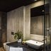 Hotel Ristorante La Rosina in Marostica bathroom with vessel sink, large mirror, and wall-mounted shelf