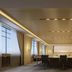 Holiday Inn & Suites Hulunbuir meeting room with long conference table, chairs, and large windows