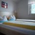 Pension Sonnalp, Ortisei: simple twin bed room with window, bedside table, and wood headboard