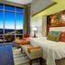 Hotel Indigo Asheville Downtown room with city and mountain views through floor-to-ceiling windows