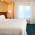 Fairfield Inn & Suites by Marriott Denver North/Westminster guest room with king bed and TV in Westminster